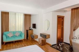 Ένα ή περισσότερα κρεβάτια σε δωμάτιο στο La Veranda Pyramids Boutique Hotel With Rooftop Access