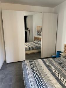 Ένα ή περισσότερα κρεβάτια σε δωμάτιο στο La Finestra sul Porto