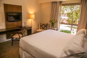 Cama o camas de una habitación en Hotel Costa Real