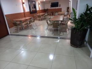 TV a/nebo společenská místnost v ubytování Hotel Napolitano