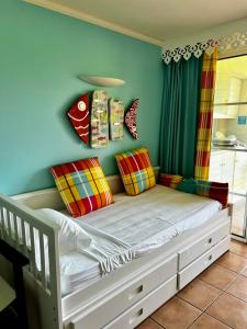 Lova arba lovos apgyvendinimo įstaigoje Studio Premium vue Mer et Piscine, résidence de vacances
