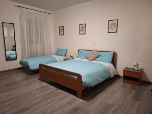 Postel nebo postele na pokoji v ubytování Borgo Carinthia