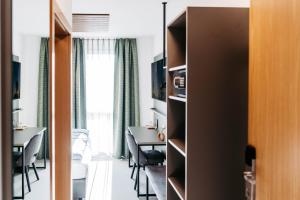 TV o dispositivi per l'intrattenimento presso Easy Room - Self Check In - Out