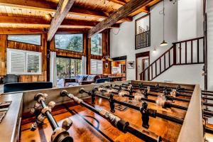 a large room with a large billiard table at Cozy Carnelian Bay Escape with Deck and Foosball in Carnelian Bay