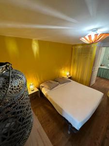 Postel nebo postele na pokoji v ubytování HACIENDA SHAKTIPAT