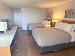 Postel nebo postele na pokoji v ubytování Quality Inn & Suites Fort Collins + 19 fotografií