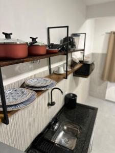 Η κουζίνα ή μικρή κουζίνα στο Lofts Viana 138 +80 φωτογραφίες