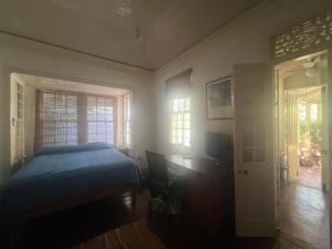 En eller flere senge i et værelse på garden studio