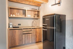Kuchyň nebo kuchyňský kout v ubytování Saarschleifenlodge + 37 fotografií