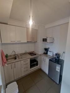 Kuchyň nebo kuchyňský kout v ubytování Depto completo un dormitorio concepción