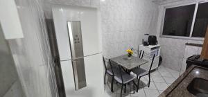 Et opholdsområde på Apartamento para temporada 2 quartos coqueiral de itaparica Edifício Angélica 302