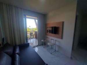 TV a/nebo společenská místnost v ubytování Flat 2 quartos Resort Marulhos Porto de Galinhas C401
