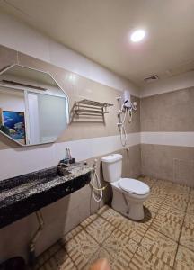 Koupelna v ubytování Grand Line Hotel Semporna
