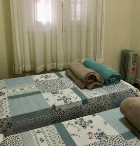 Postel nebo postele na pokoji v ubytování Apartamento prático e central