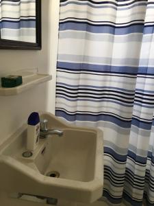 Koupelna v ubytování Apartamento prático e central + 8 fotografií