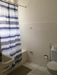 Koupelna v ubytování Apartamento prático e central