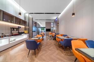 宜尚酒店(武汉天河机场宋家岗地铁站店)餐厅或其他用餐的地方