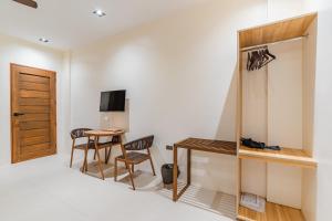 Μια τηλεόραση ή/και κέντρο ψυχαγωγίας στο Orchrd Lodge