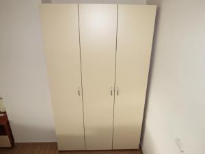 a pair of white wardrobes in a room at Camp Krka in Lozovac