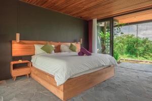 Ένα ή περισσότερα κρεβάτια σε δωμάτιο στο Villa Batavira