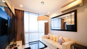TV a/nebo společenská místnost v ubytování Spacious 2BR at The Via and The Vue Apartment Surabaya By Travelio