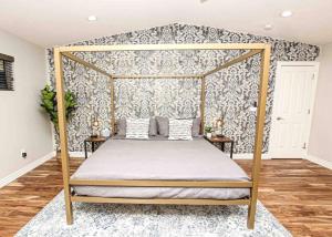 a bedroom with a canopy bed in a room at Scottsdale Farmhouse in Scottsdale +58 photos