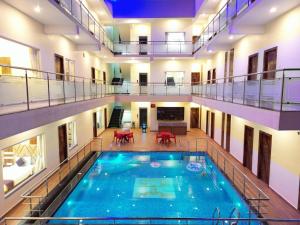Bazén v ubytování Elegant Beach Resort nebo v jeho okolí