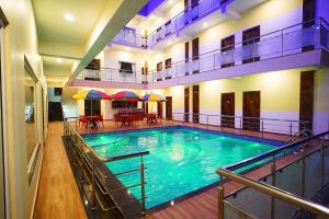 Bazén v ubytování Elegant Beach Resort nebo v jeho okolí