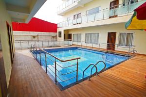 Bazén v ubytování Elegant Beach Resort nebo v jeho okolí