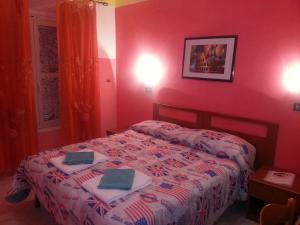 Postel nebo postele na pokoji v ubytování Roxena house