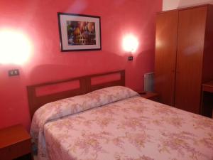 Postel nebo postele na pokoji v ubytování Roxena house