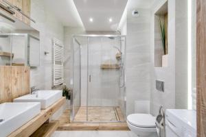 Et badeværelse på Apartment Masarska
