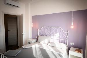 Postel nebo postele na pokoji v ubytování Da Filippo B&B