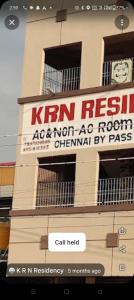 a building with a sign on the side of it at KRN Residency in Nagari