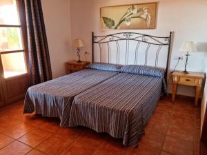 Ein Bett oder Betten in einem Zimmer der Unterkunft Agroturismo Son Marge