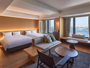 Dorsett by Agora Osaka Sakai客房内的一张或多张床位