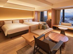 Dorsett by Agora Osaka Sakai客房内的一张或多张床位