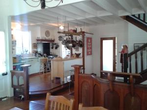 a room with a kitchen and a dining room at The Old Church Bed and Breakfast in Boonah
