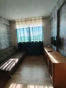 Телевизор и/или развлекательный центр в Apto Centro com estacionamento +3 фотографии