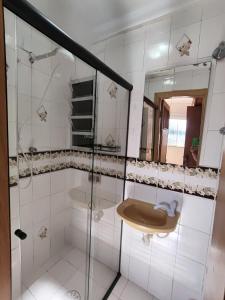 Ванная комната в Apto Centro com estacionamento