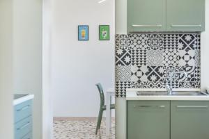 Kuchyň nebo kuchyňský kout v ubytování MM Ciampino Rooms