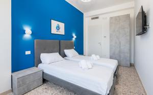Postel nebo postele na pokoji v ubytování MM Ciampino Rooms