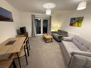 TV a/nebo společenská místnost v ubytování Tranquil Escape