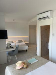 TV a/nebo společenská místnost v ubytování Hotel Aromar