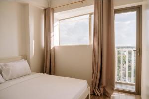 Ένα ή περισσότερα κρεβάτια σε δωμάτιο στο Spacious Bright Family Escape