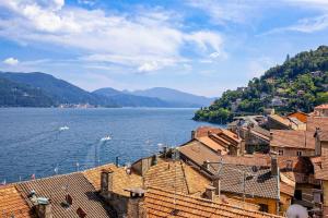 a view of a town next to a large body of water at Casa Sofia in Cannobio