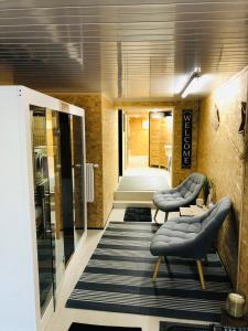 Posezení v ubytování Vakantiewoning De Passerelle + 37 fotografií