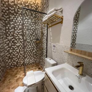 Ένα μπάνιο στο Casabella Homestay 105 Batam Penuin