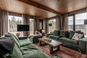 Posezení v ubytování Newly Built Luxury lodge 10 Min to Idre Slopes, Perfect for Large Groups 16 Beds