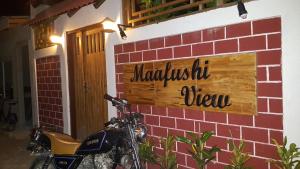 Certificato, attestato, insegna o altro documento esposto da Maafushi View
